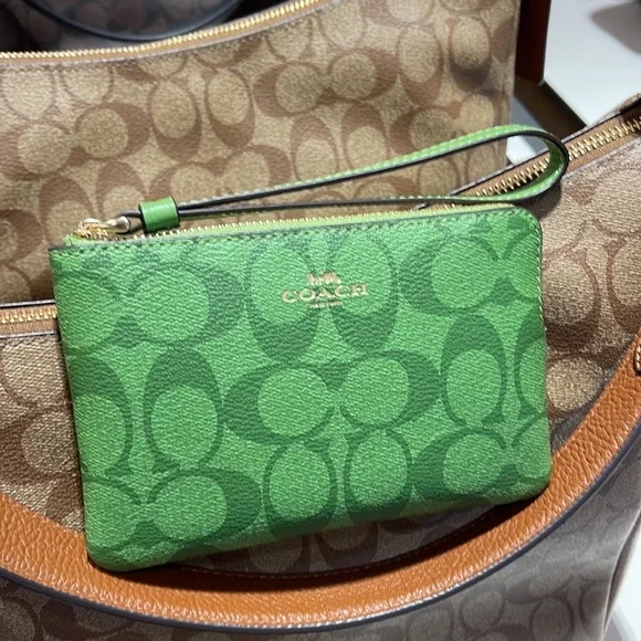 Coach Corner Zip Wristlet In Signature Canvas 
Im/Neon Green - Picture 14 of 16